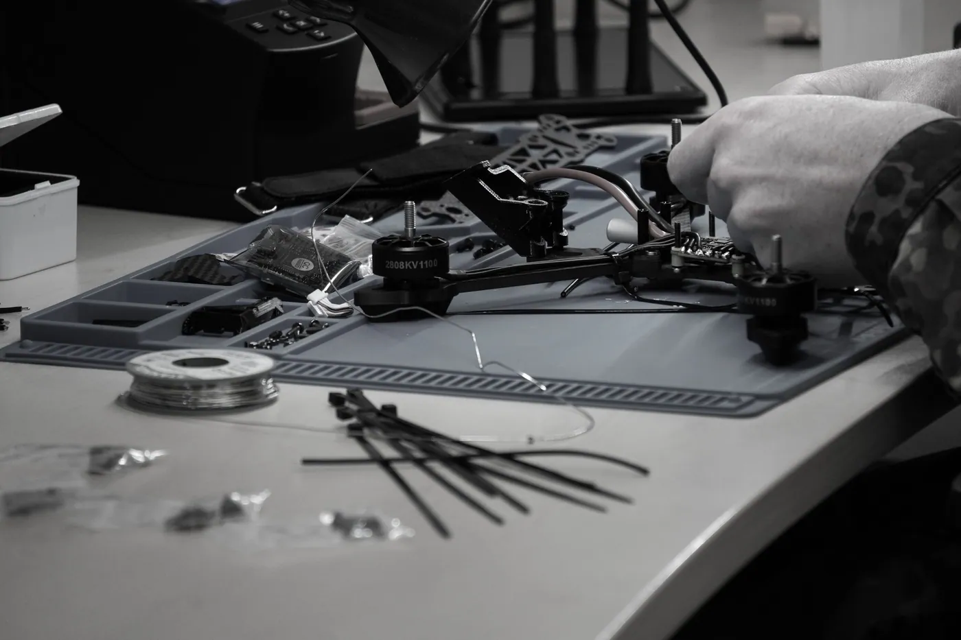 FPV components on a workbench