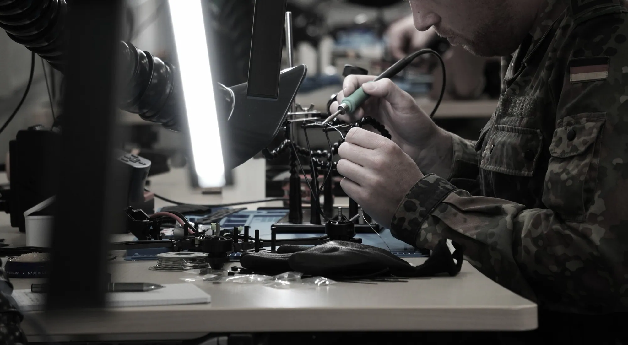 Building an FPV drone at a workbench